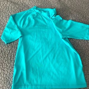 Boys shirts bundle. 10-12 size.  One shirt is a swimming shirt.